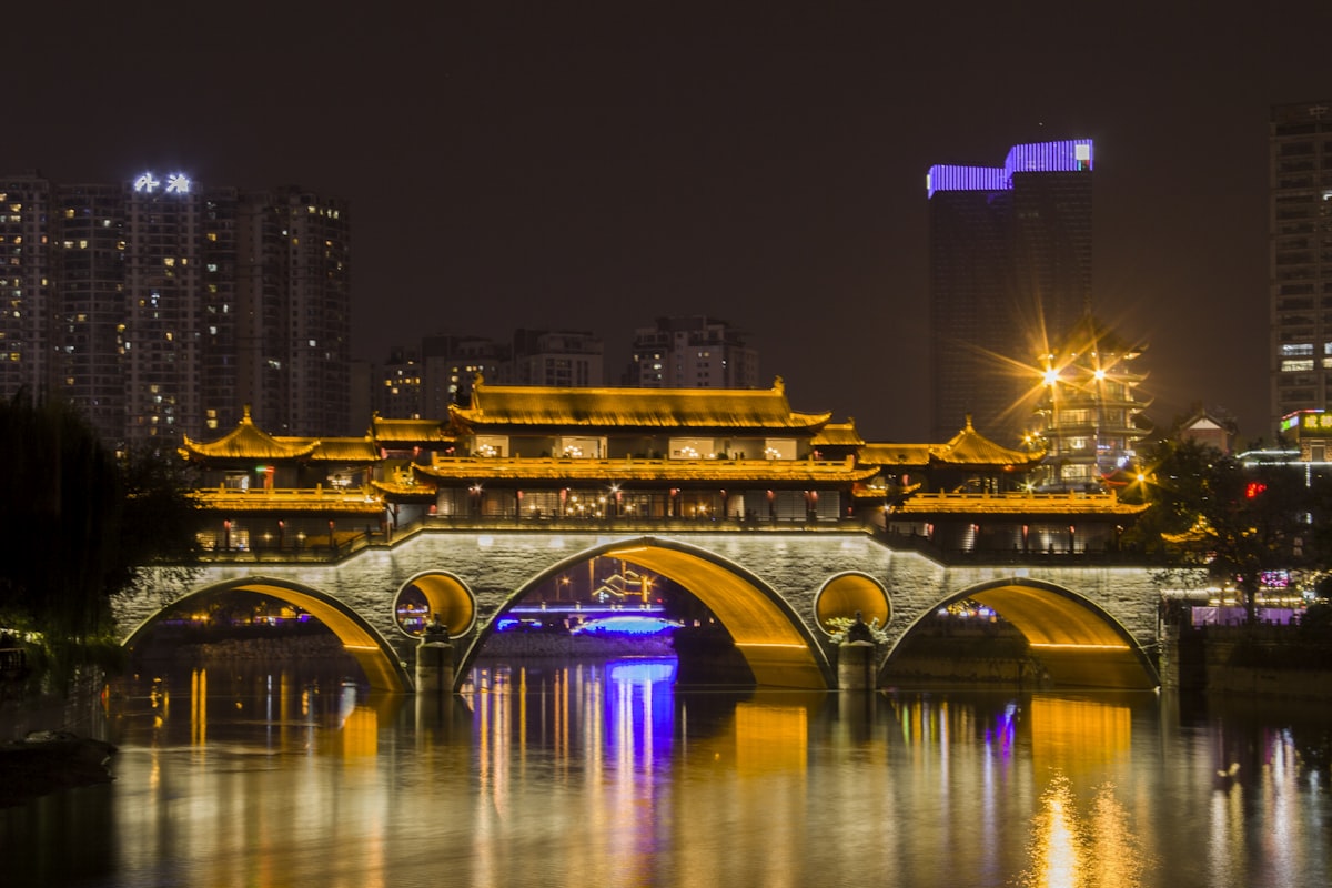 Anshun Bridge glowing at night over the Jin River in Chengdu