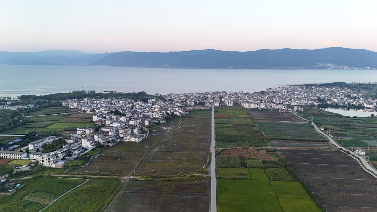 Aerial view of villages and farmland stretching to Erhai Lake, Dali