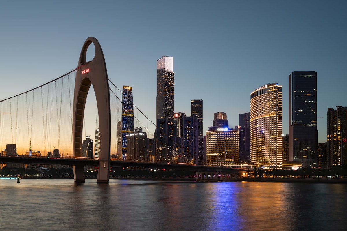 Liede Bridge spanning the Pearl River at dusk against the Guangzhou skyline