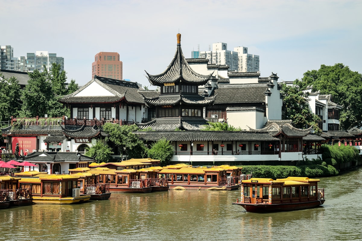 Tour boats moored on the Qinhuai River beside Nanjing's Confucius Temple