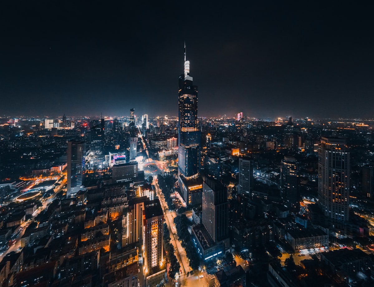Nanjing at night with Zifeng Tower rising above the illuminated downtown