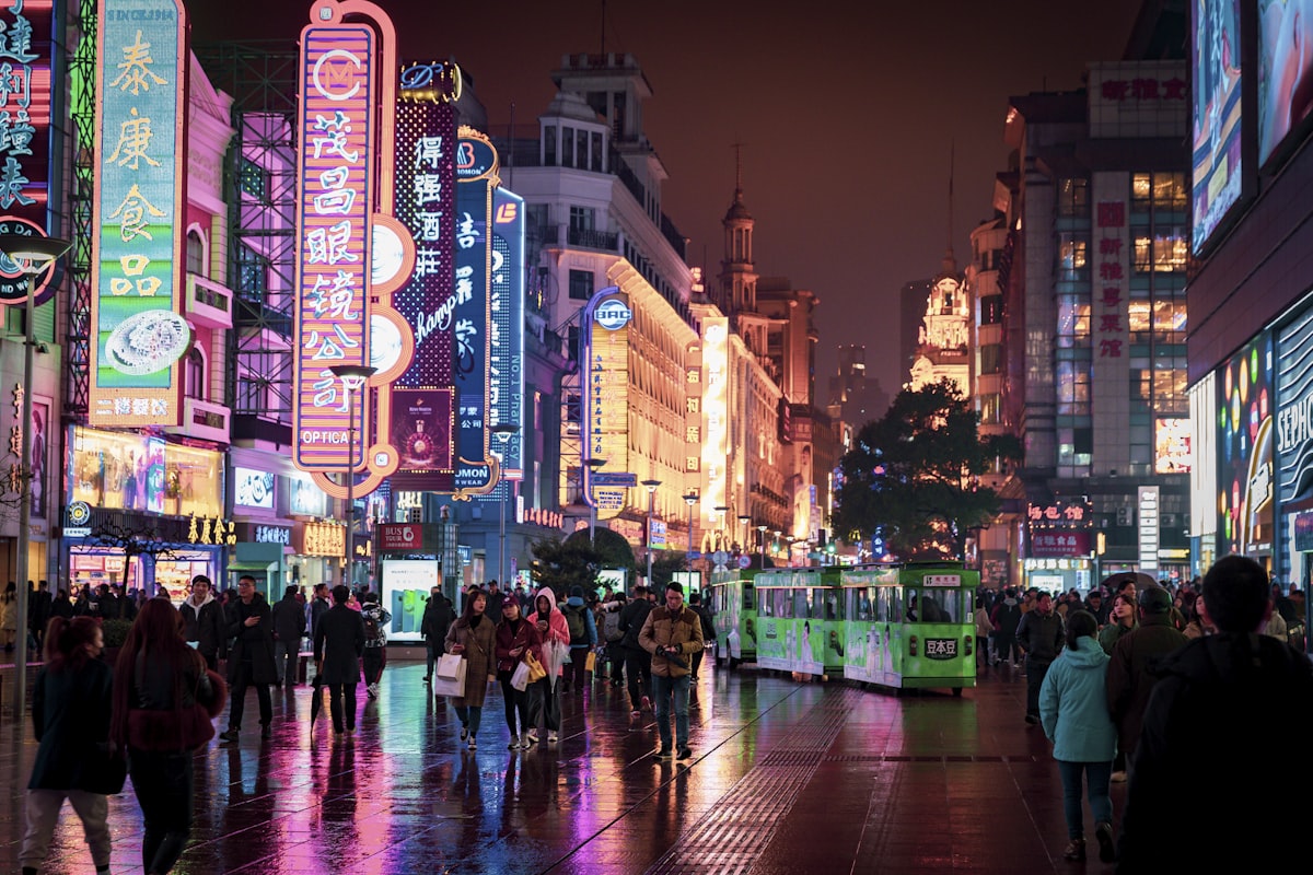 Neon signs and evening crowds on Nanjing Road, Shanghai's main shopping street