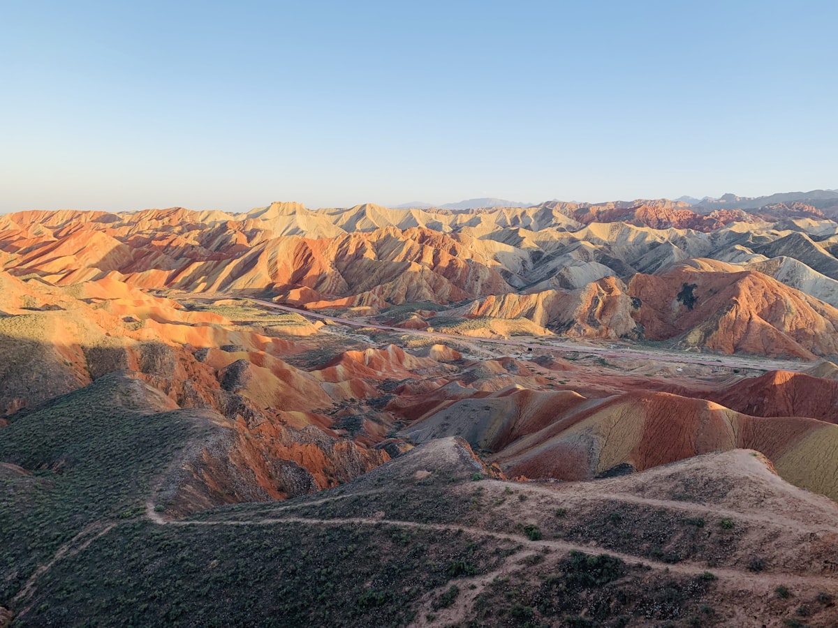 Sunset over the rainbow-striped badlands of Zhangye Danxia National Geopark