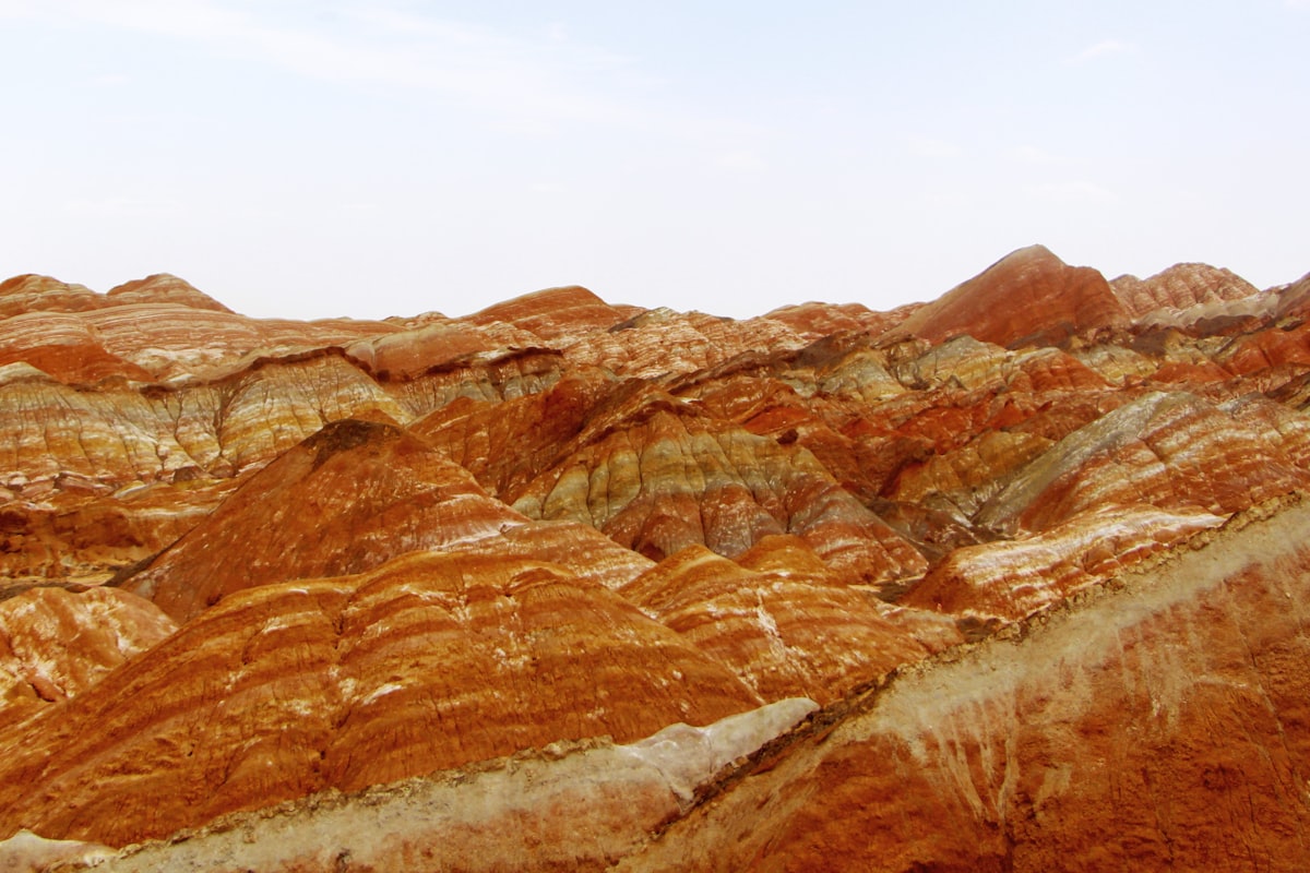 Red and orange striped sandstone ridges at the Zhangye Danxia landform