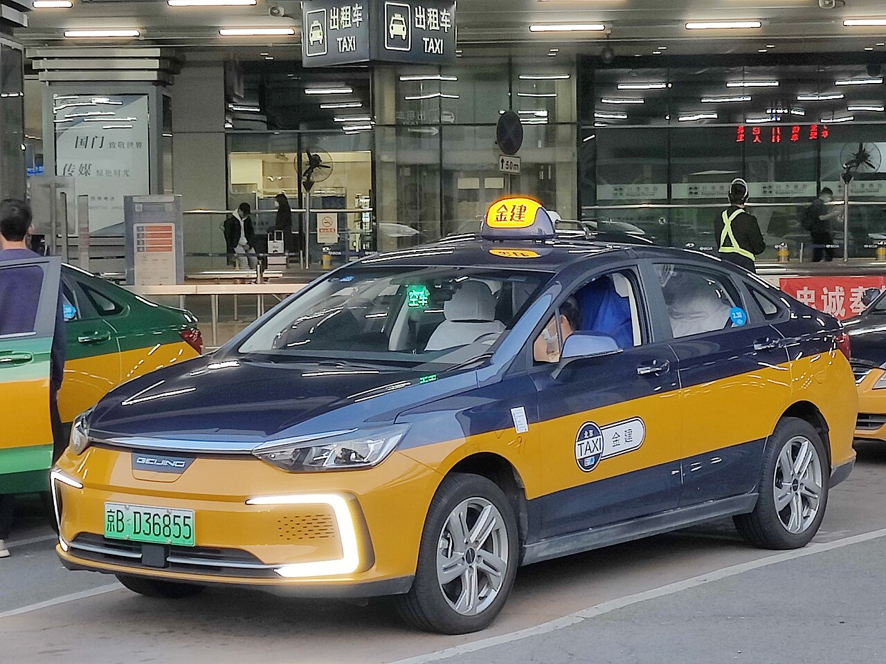 A Beijing taxi on a city street