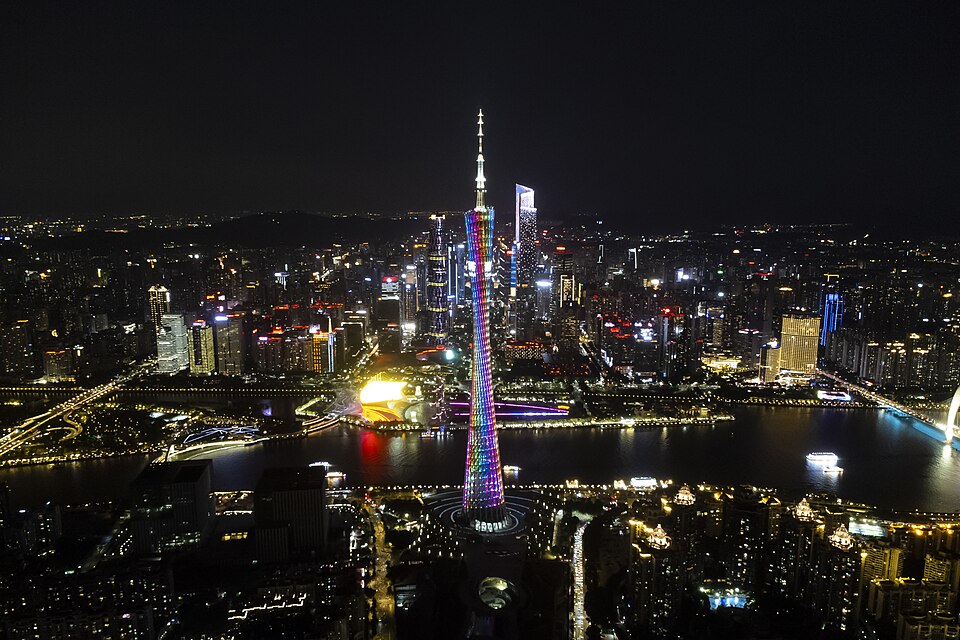 The Canton Tower lit up over the Pearl River at night