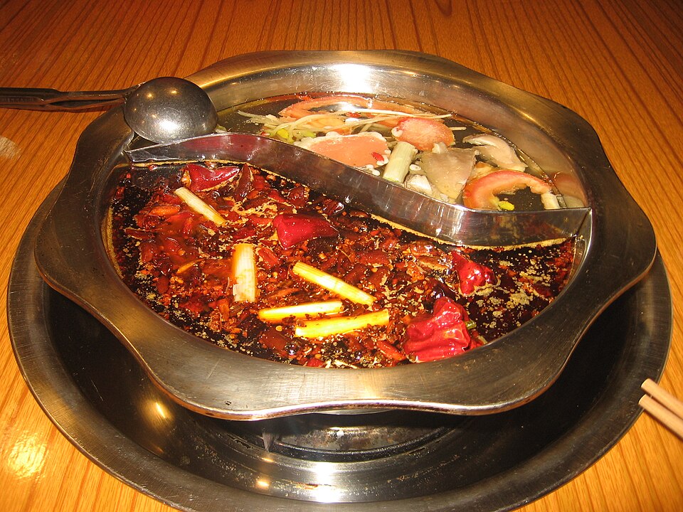 A bubbling pot of spicy Sichuan-style red-broth hotpot