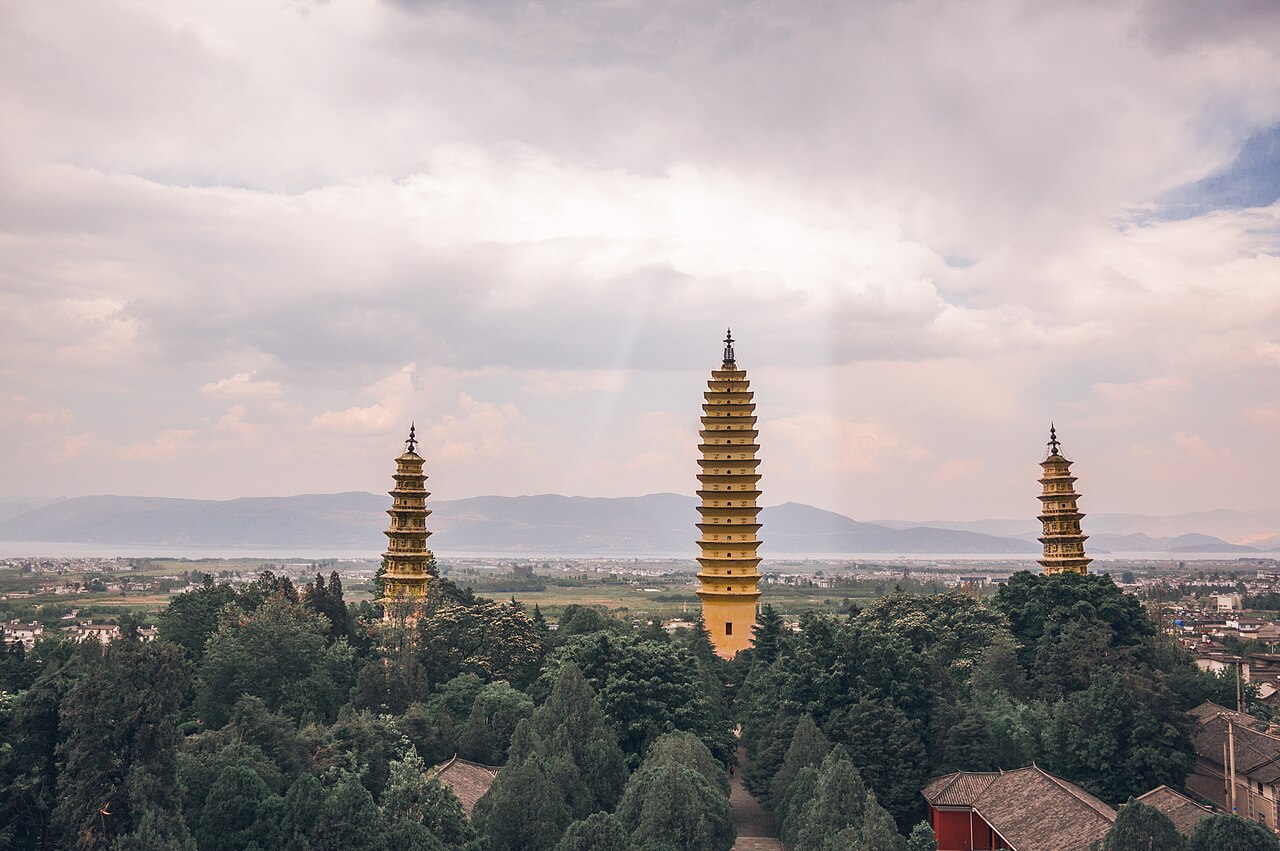 The three pagodas of Chongsheng Temple standing above the trees at Dali
