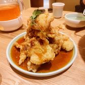 Guo bao rou: battered pork in a glossy orange sweet-and-sour sauce