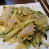 Cold liangpi noodles tossed with shredded cucumber
