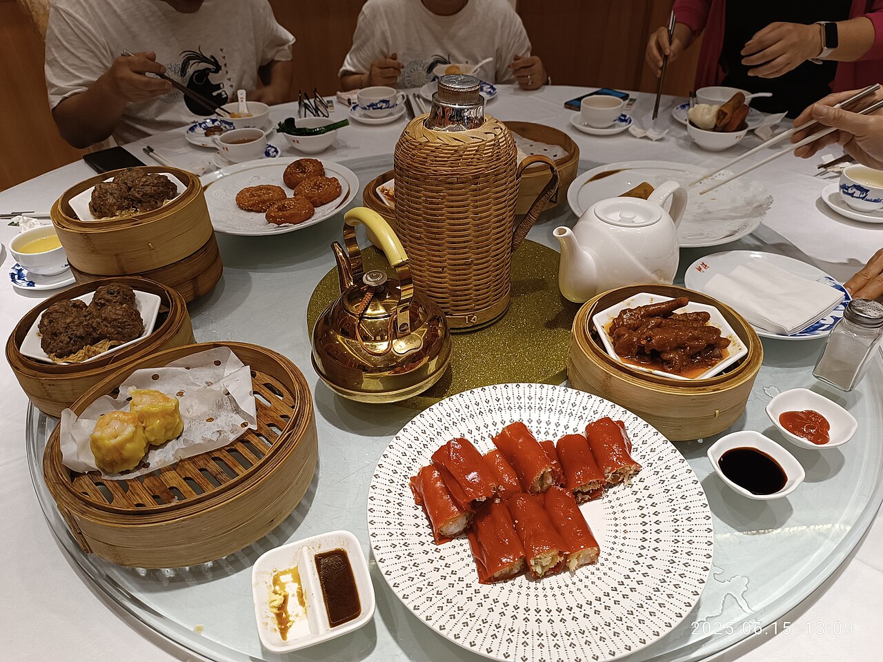 Steamer baskets of dim sum on a restaurant table in Guangzhou