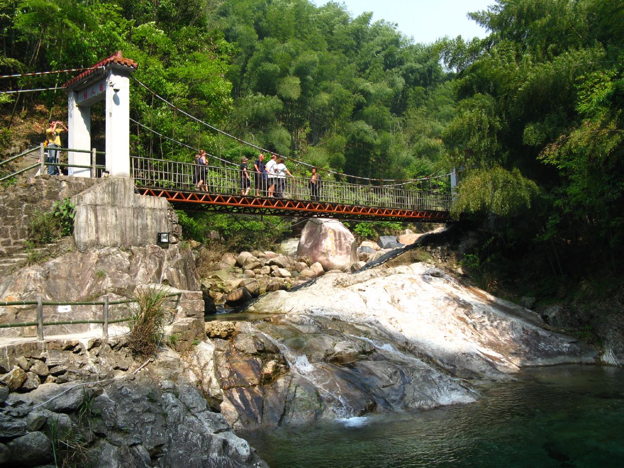 A bridge over the stream in Emerald Valley's bamboo gorge