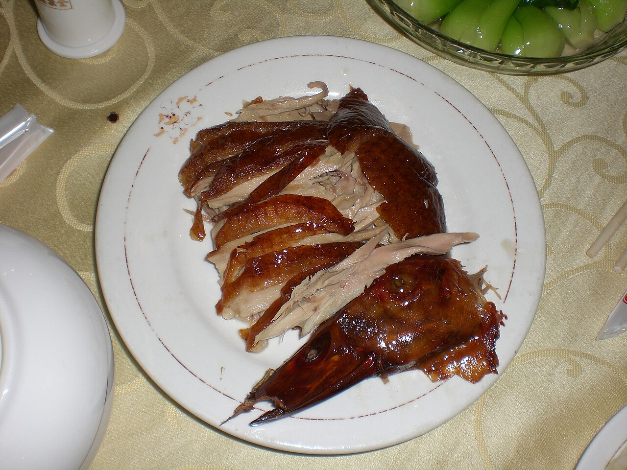 A plate of sliced Peking duck in a Beijing restaurant