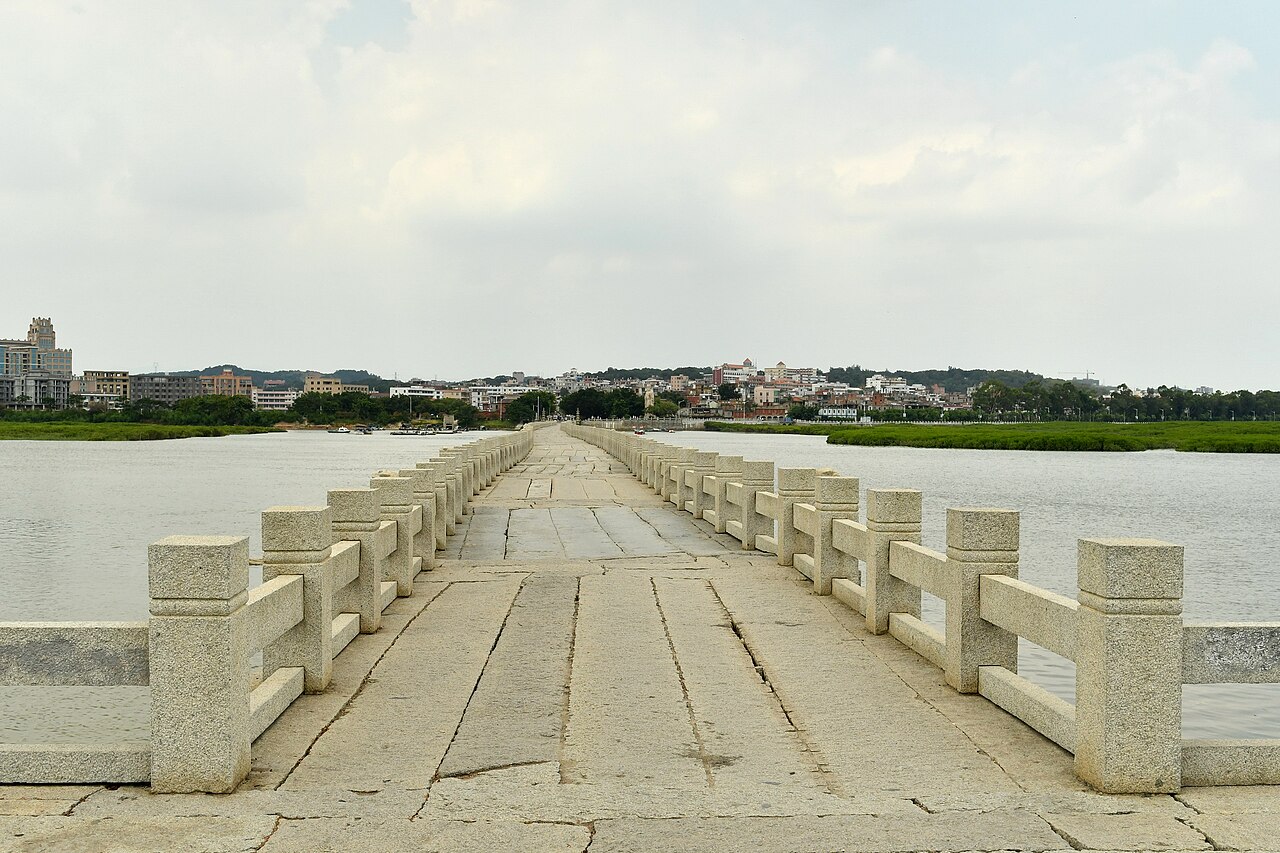 The long stone beams of Luoyang Bridge stretching across the estuary