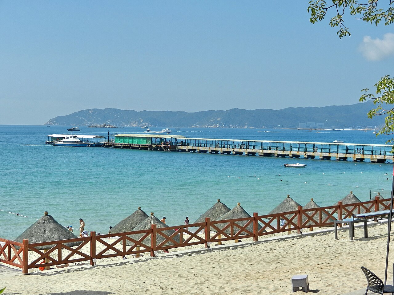 The calm turquoise water and white sand of Yalong Bay on Hainan Island