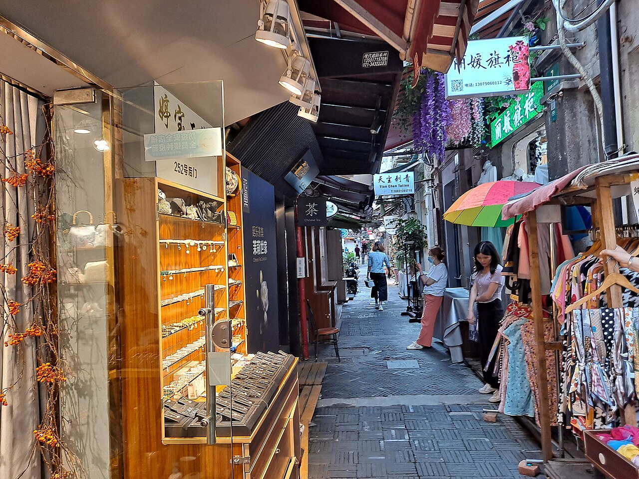 Shops and studios lining a narrow shikumen lane in Tianzifang, Shanghai