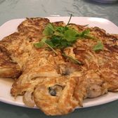 Pieces of fried oyster omelette on a plate