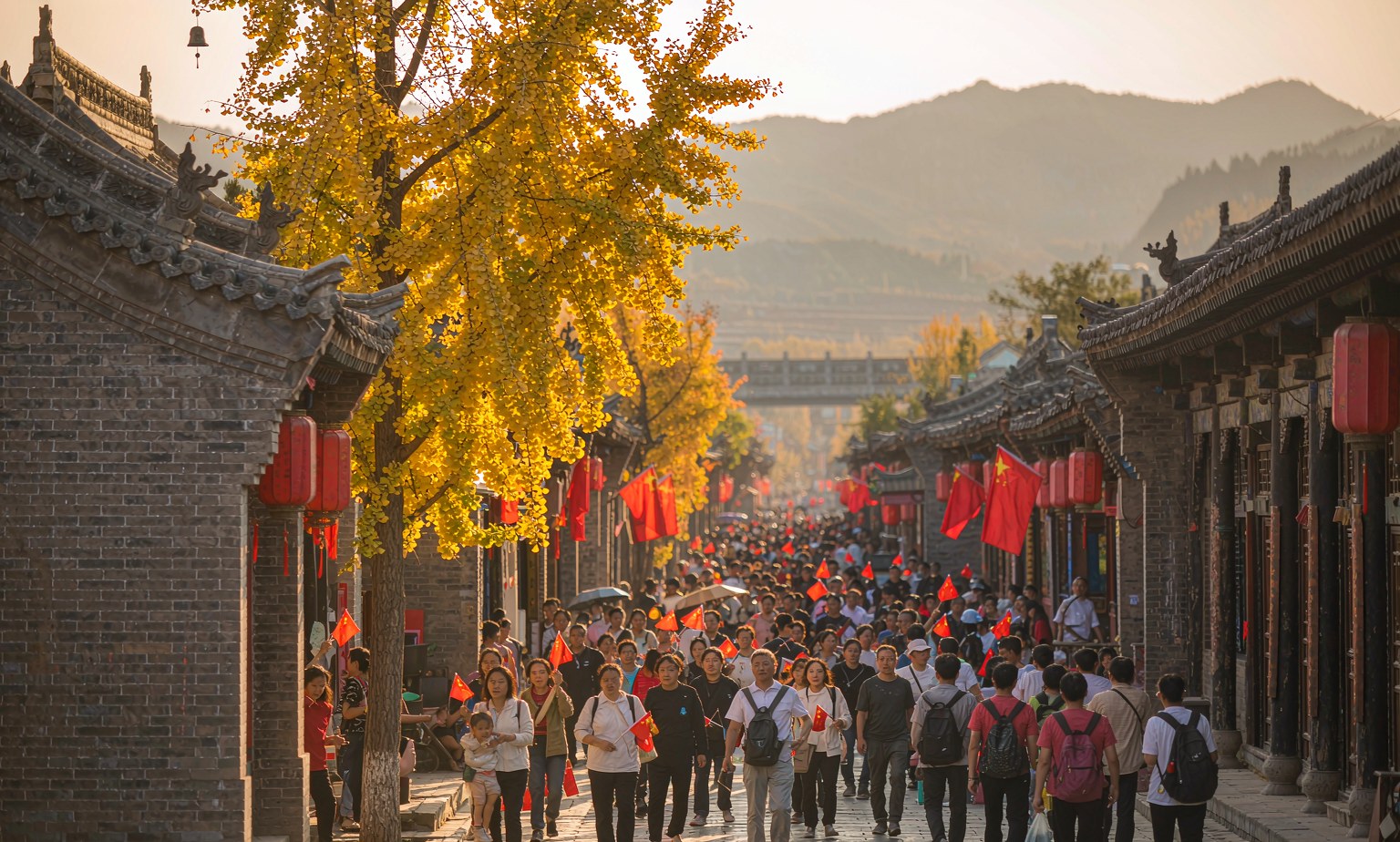 An editorial illustration of a crowded old Chinese street during the National Day holiday, red flags above the crowd