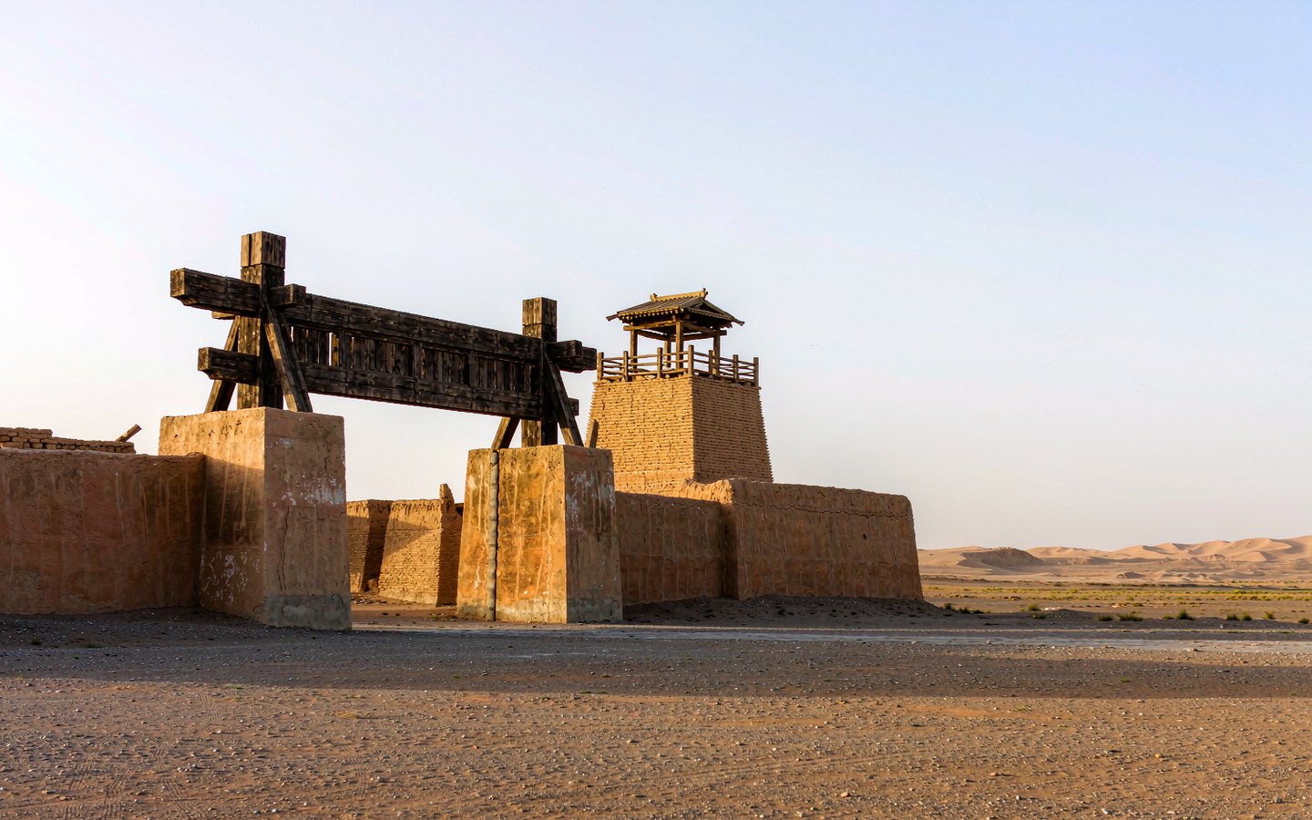 Han-style frontier gate and beacon tower alone in the Gobi