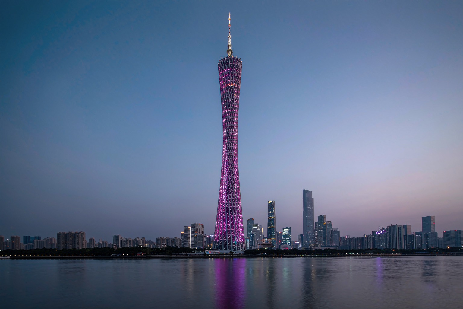 Canton Tower and the Zhujiang New Town skyline at dusk in Guangzhou