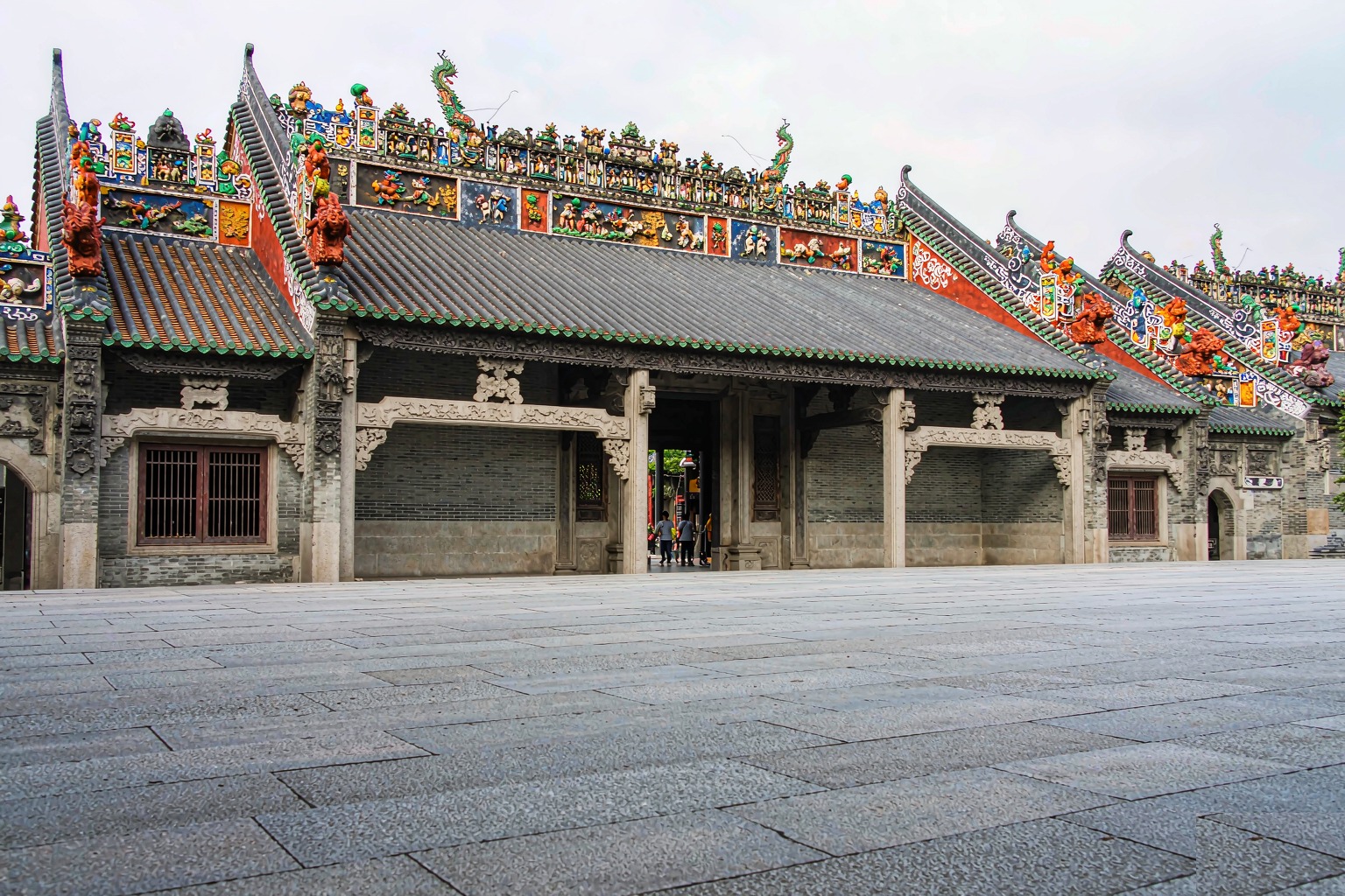 The ornamented roofline and grey brick front of the Chen Clan Academy, Guangzhou