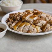 A plate of poached white-cut chicken served with rice