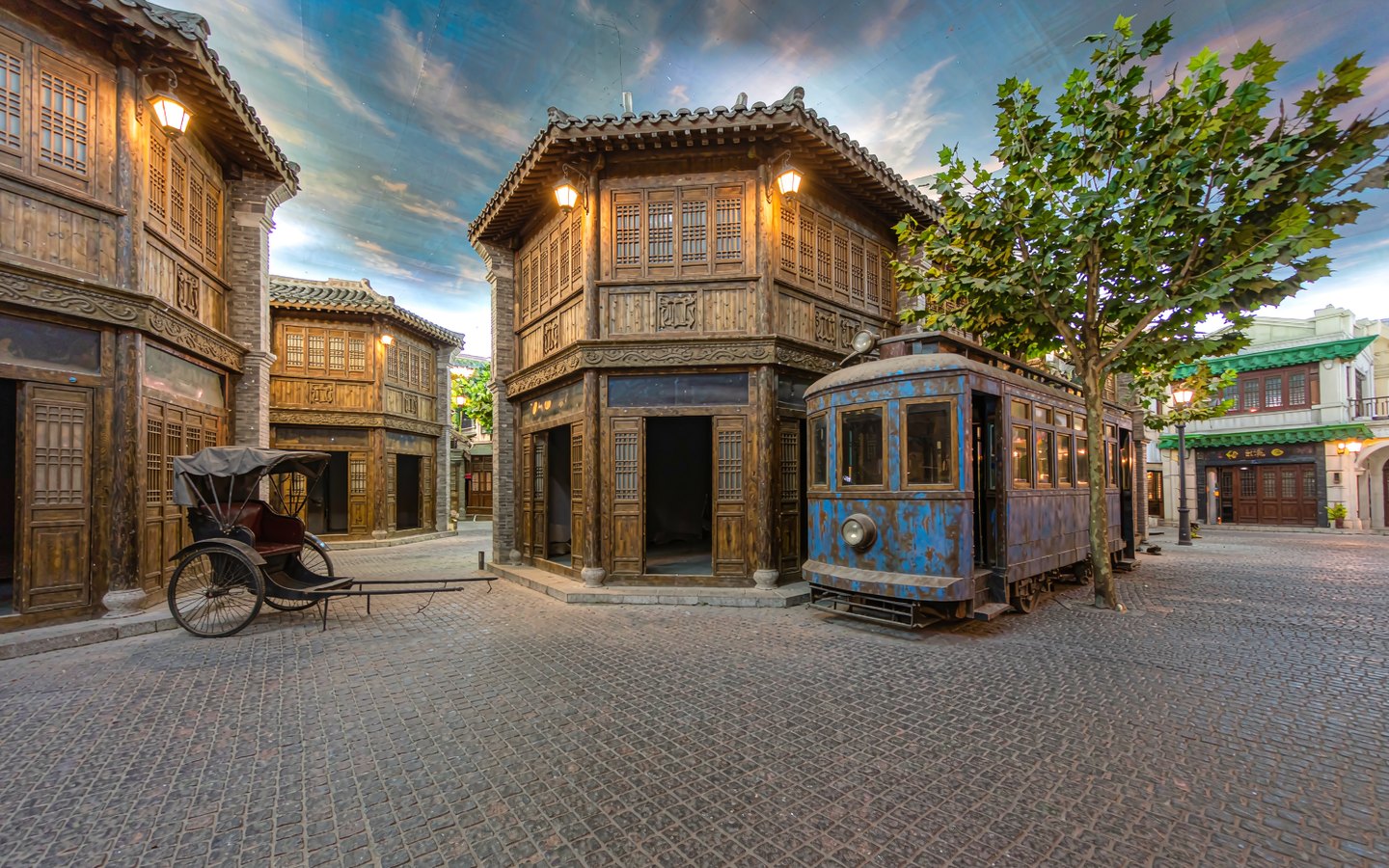 Recreated 1930s street with rickshaw inside a museum basement