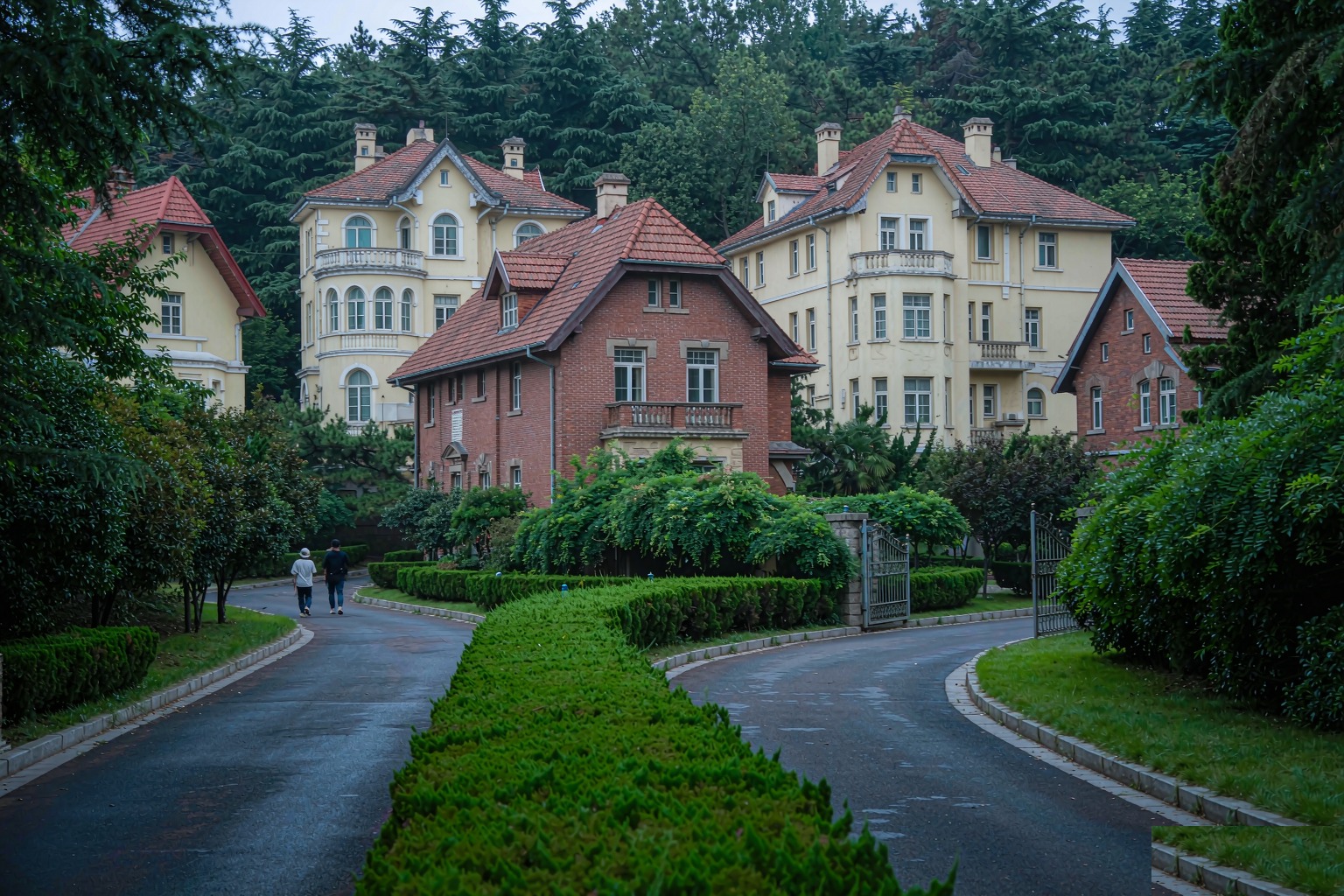 European-style villas in Qingdao's Badaguan scenic area behind a screen of trees