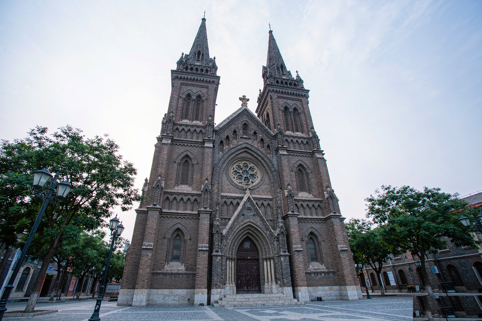 St Michael's Cathedral with twin spires above the rooftops of Qingdao's old town
