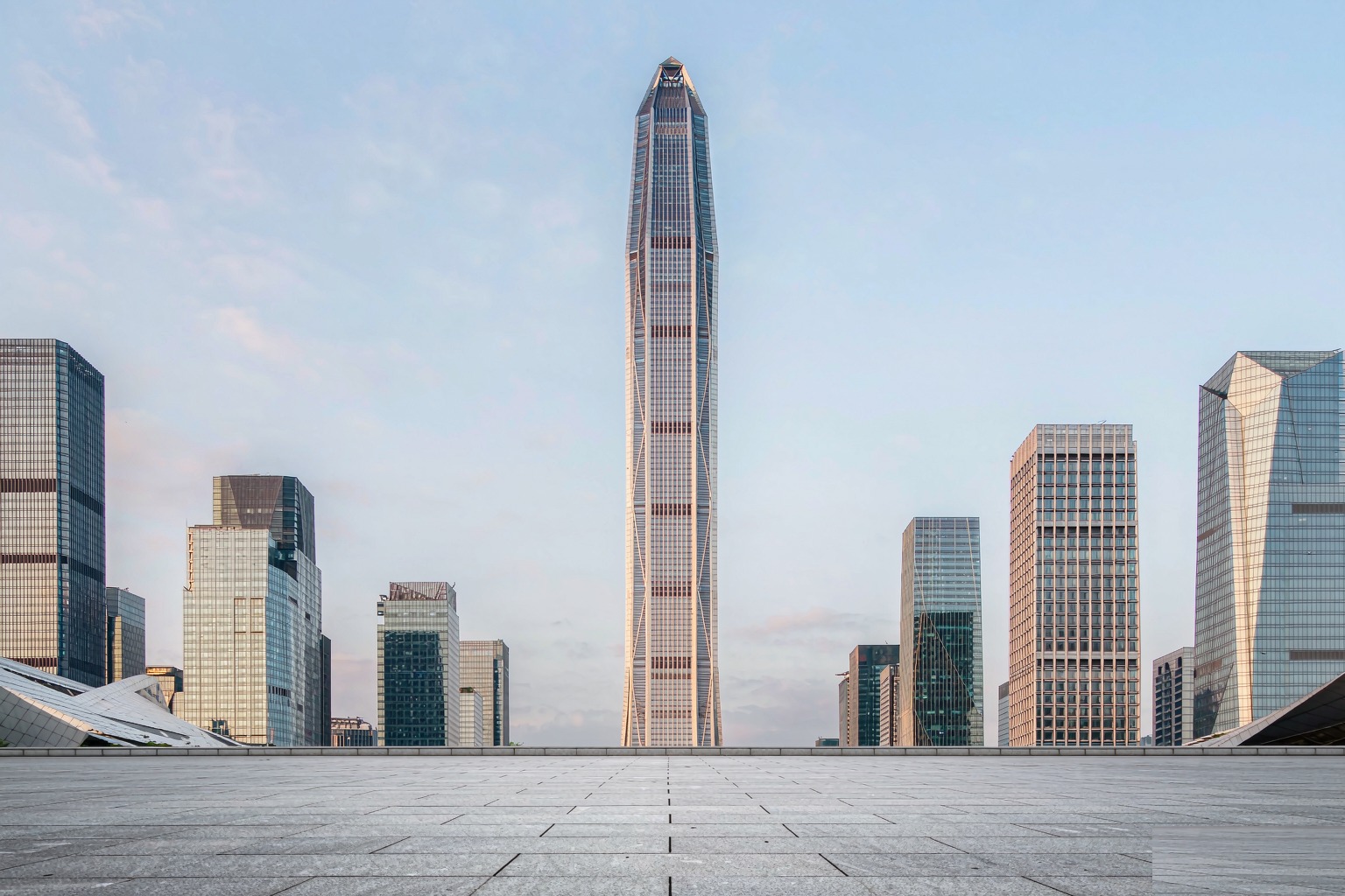 The Ping An Finance Centre tower tapering into a hazy sky above the Shenzhen CBD
