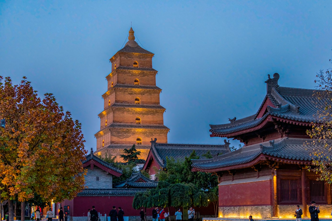 Big Wild Goose Pagoda lit at dusk above the Da Ci'en temple roofs in Xian